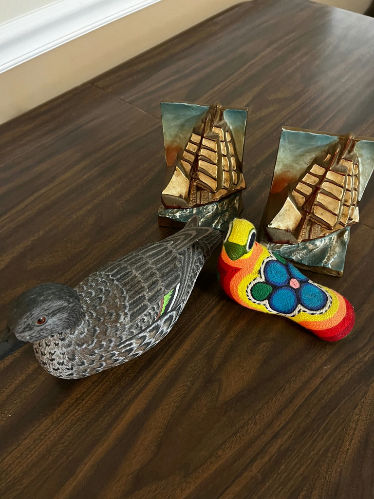 Duck decoy, knitted bird, ship sculptures, and wooden gavel - image 1 of 5