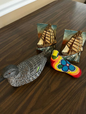 Duck decoy, knitted bird, ship sculptures, and wooden gavel - Image 1 of 5