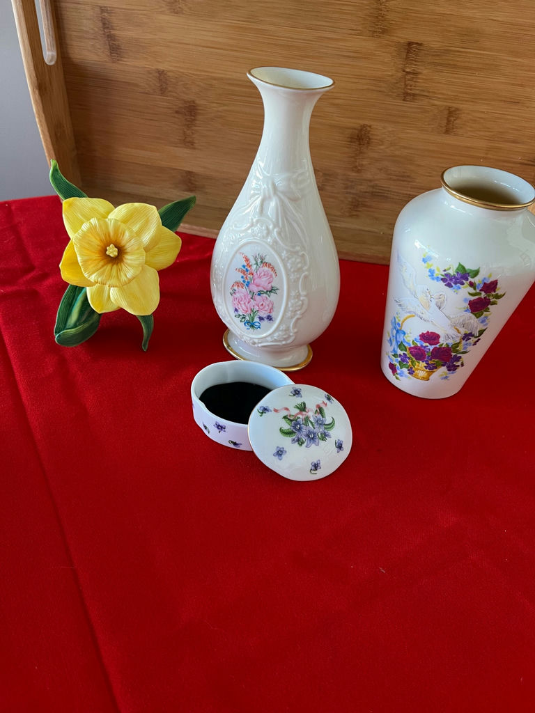Floral porcelain vases, a small lidded container, and a yellow artificial daffodil - image 1 of 2