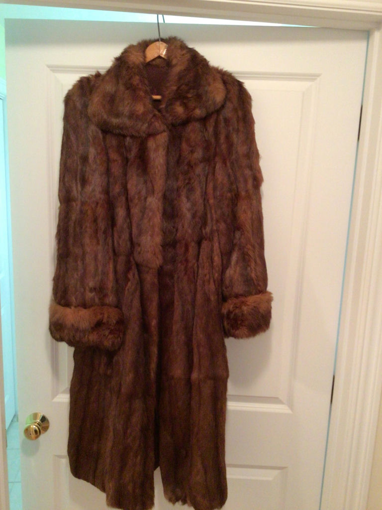 Long brown fur coat with fur cuffs - image 1 of 4