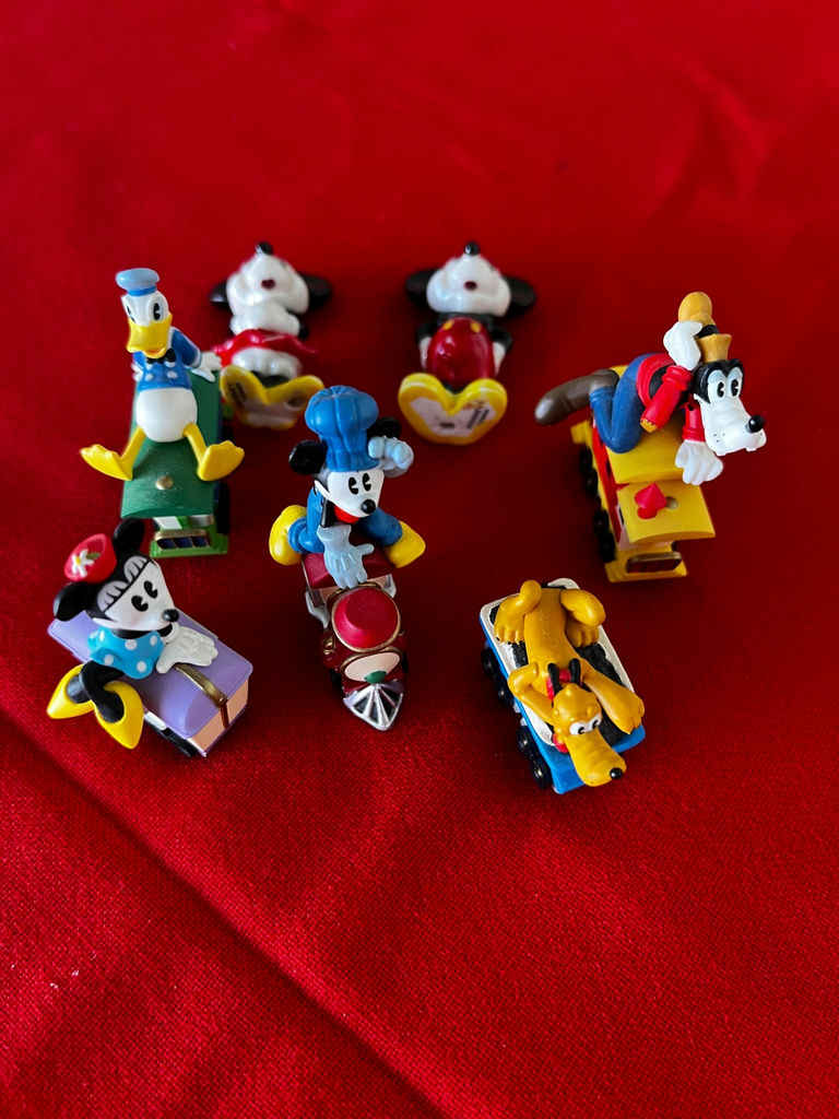 Disney character mini figurines on toy vehicles - image 2 of 2