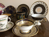 Assorted porcelain tea cups, teapots, and plates - thumbnail 5 of 13