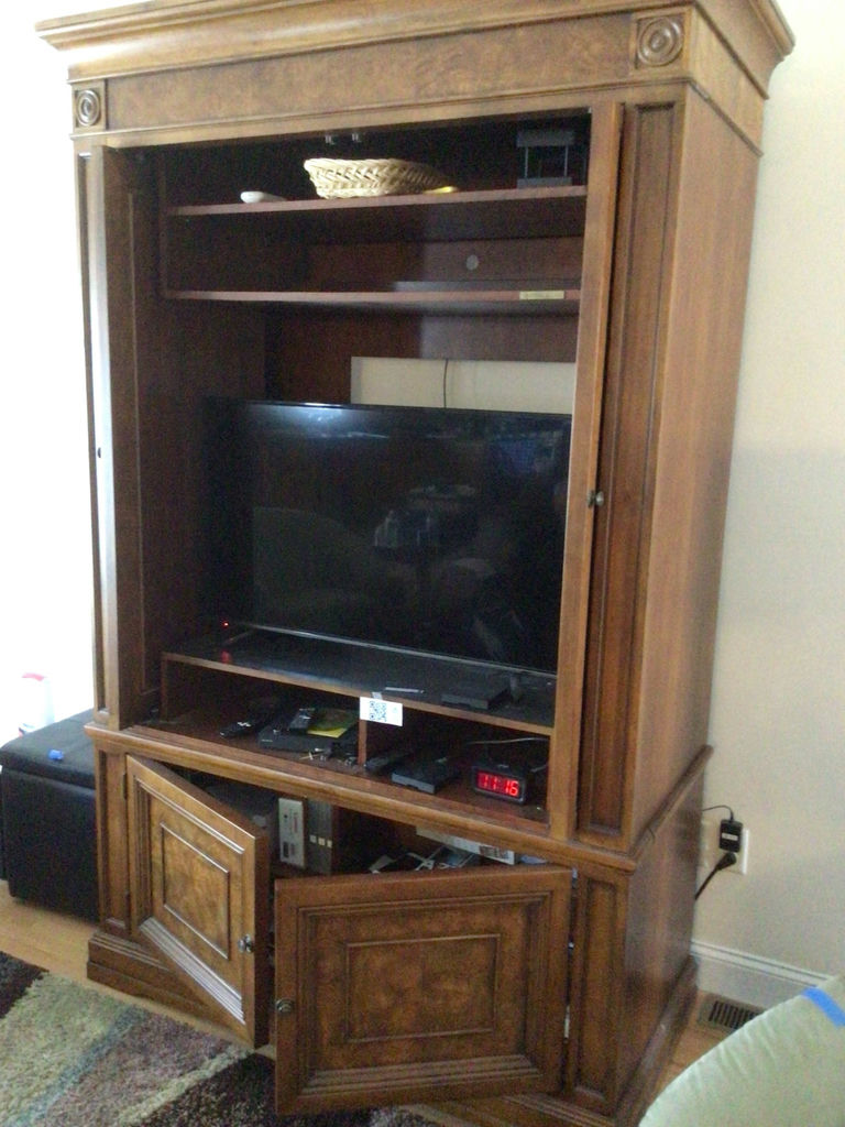 Large wooden entertainment center - image 2 of 2