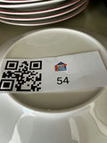 Assorted Ceramic Dinnerware with Floral,pumpkin, and Checkered Motifs - thumbnail 1 of 6