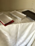 White rectangular plates and a red and a black tray - thumbnail 1 of 2