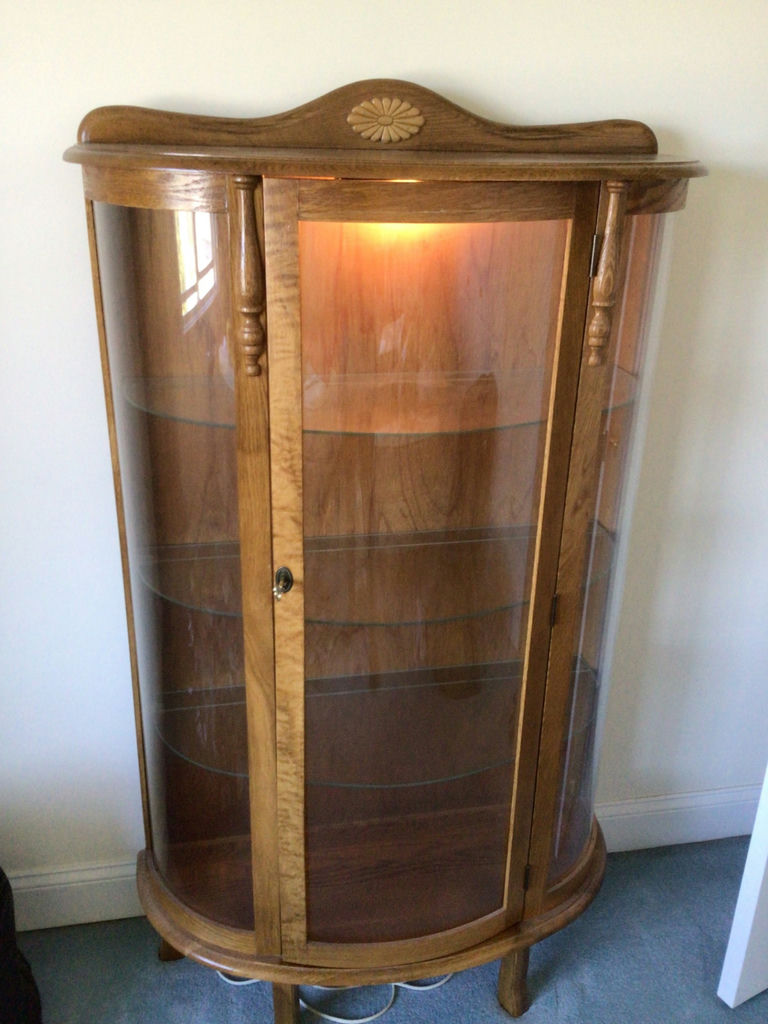 Wooden curved-front curio cabinet - image 1 of 3