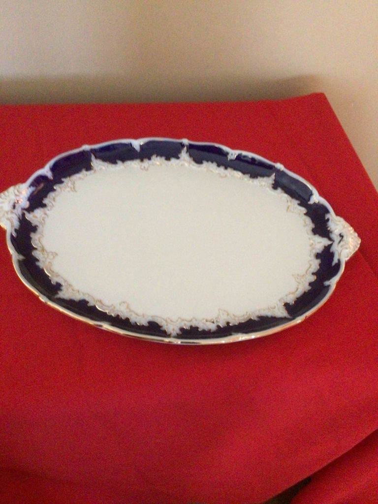 Oval porcelain platter with cobalt blue border and gold trim - image 1 of 3