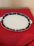 Oval porcelain platter with cobalt blue border and gold trim - thumbnail 1 of 3
