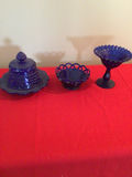 Cobalt blue glass lidded jar, openwork bowl, and stemmed compote - thumbnail 1 of 3