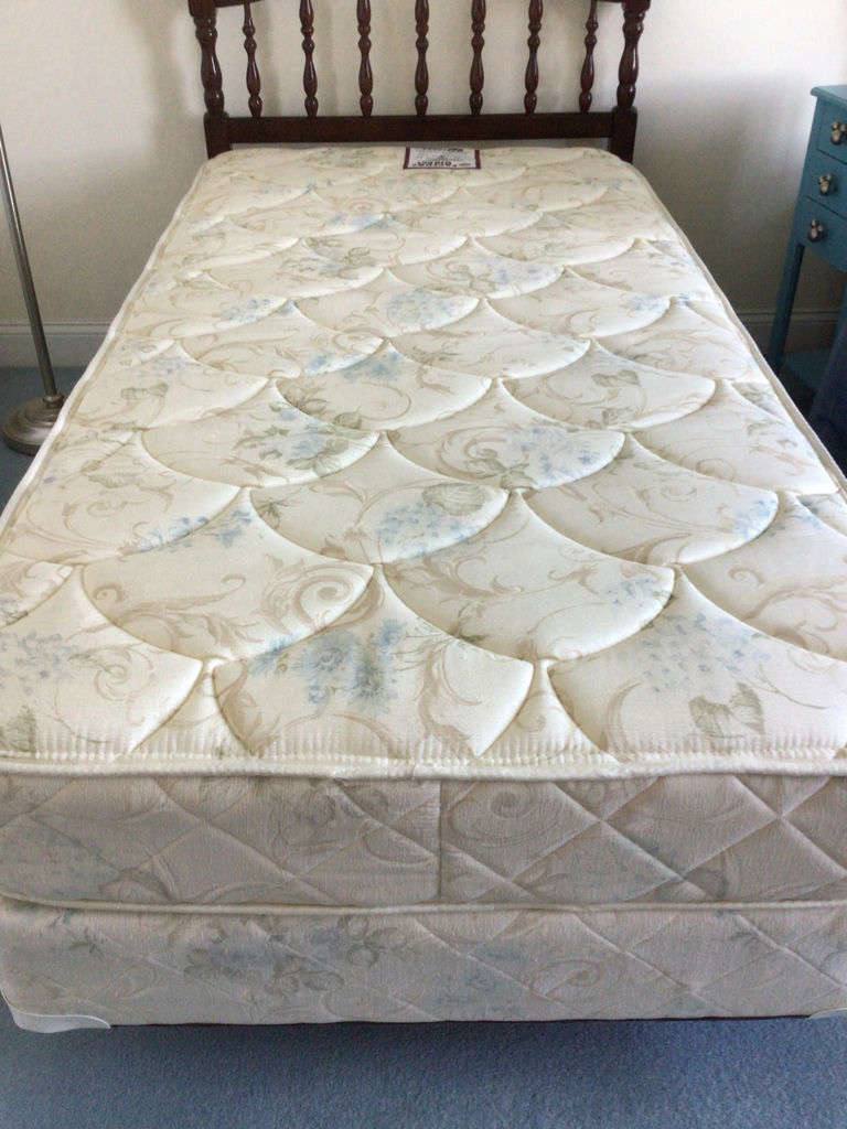 Wooden spindle-headboard bed with quilted mattress  - image 2 of 2