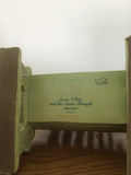 Dopey figurine with a decorative green pipe organ and totem-pole sculptures - thumbnail 5 of 6