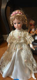 Porcelain Doll in White Lace Dress - thumbnail 1 of 5