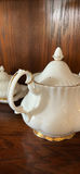 White Porcelain Teapot with Gold Trim - thumbnail 2 of 7