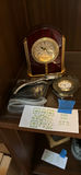 Bulova mantel clock, wristwatch, and decorative clocks - thumbnail 1 of 5
