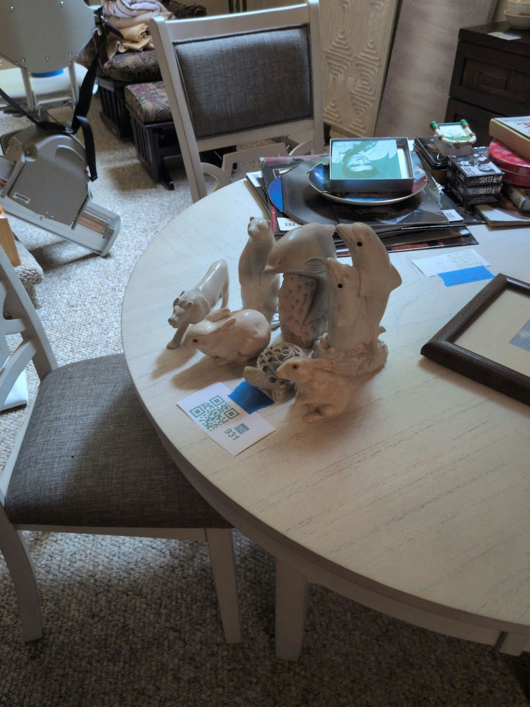 Collection of Carved Animal Figurines - image 1 of 11