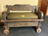 Antique carved wooden settle bench with cushion - thumbnail 1 of 11