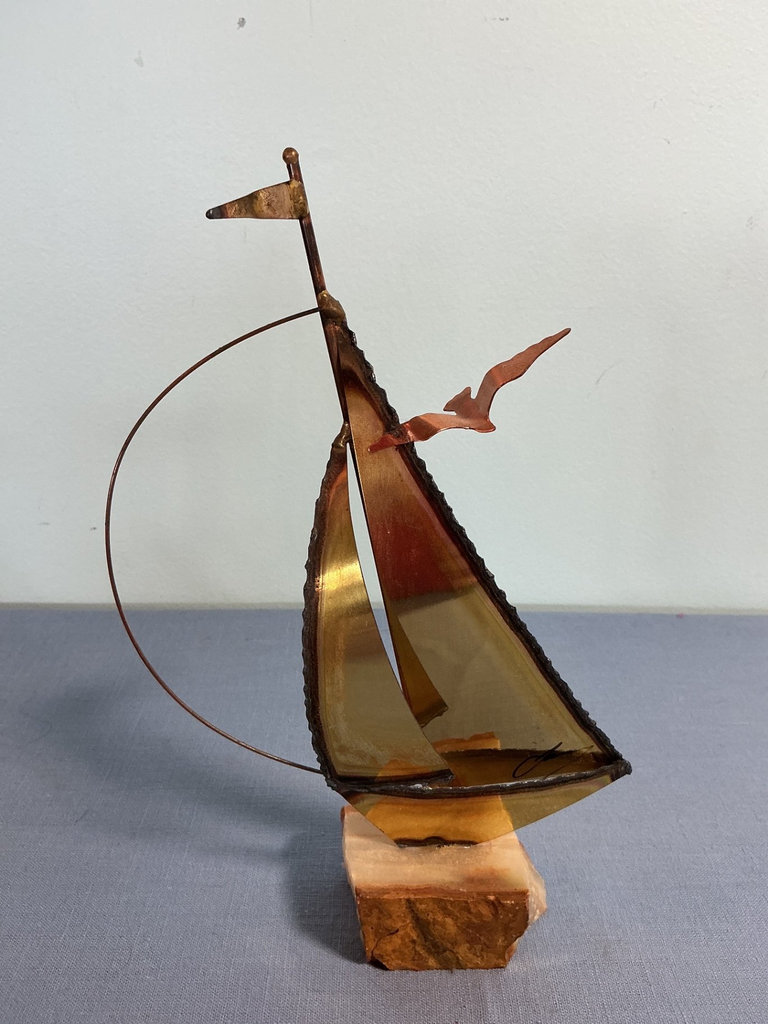 Two metal sculptures: signpost wheel and sailboat - image 3 of 3