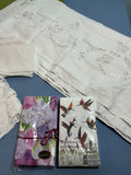 Assorted linen textiles: lace, embroidery, and plaid fabric - thumbnail 5 of 6