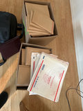 Red office chair with whiteboard and assorted office supplies - thumbnail 4 of 9