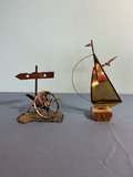 Two metal sculptures: signpost wheel and sailboat - thumbnail 2 of 3