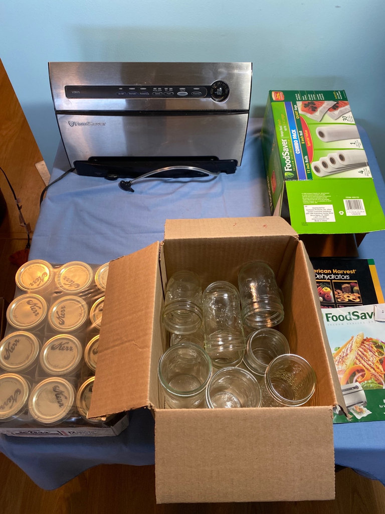 FoodSaver vacuum sealing system with roll packs, jars, and lids - image 1 of 5