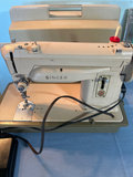 Vintage Singer sewing machine with manual and accessories - thumbnail 3 of 5