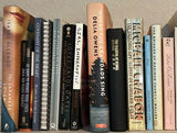 Assorted Fiction and Nonfiction Books with Decorative Ivy Plant - thumbnail 2 of 4