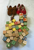 Children's Shoes, Wooden Alphabet Blocks, and Small Figurine - thumbnail 1 of 3