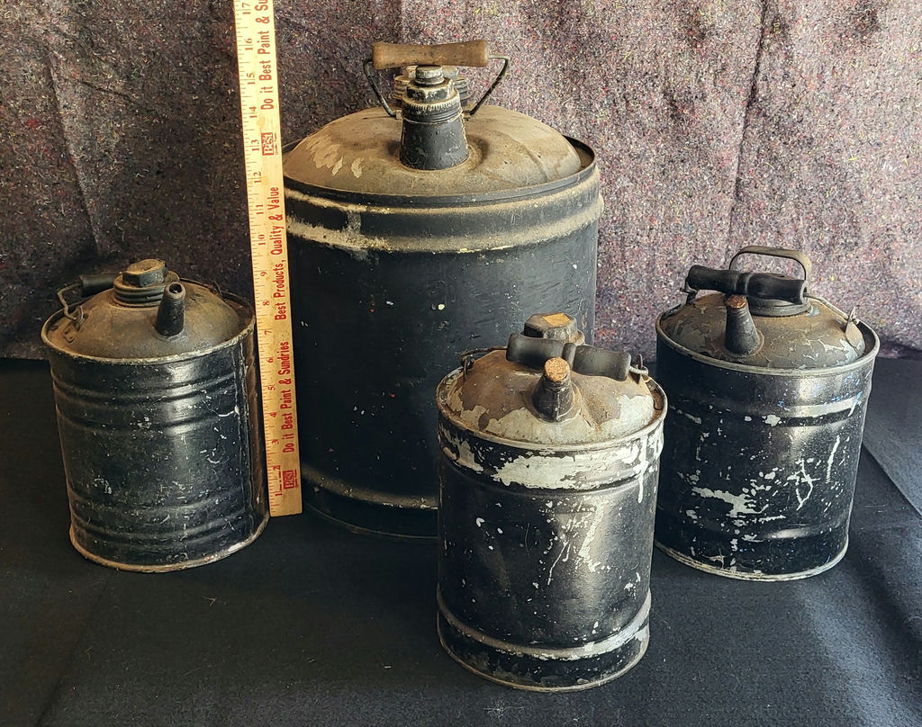 Lot of 4 Antique Black Gas Cans - image 1 of 3