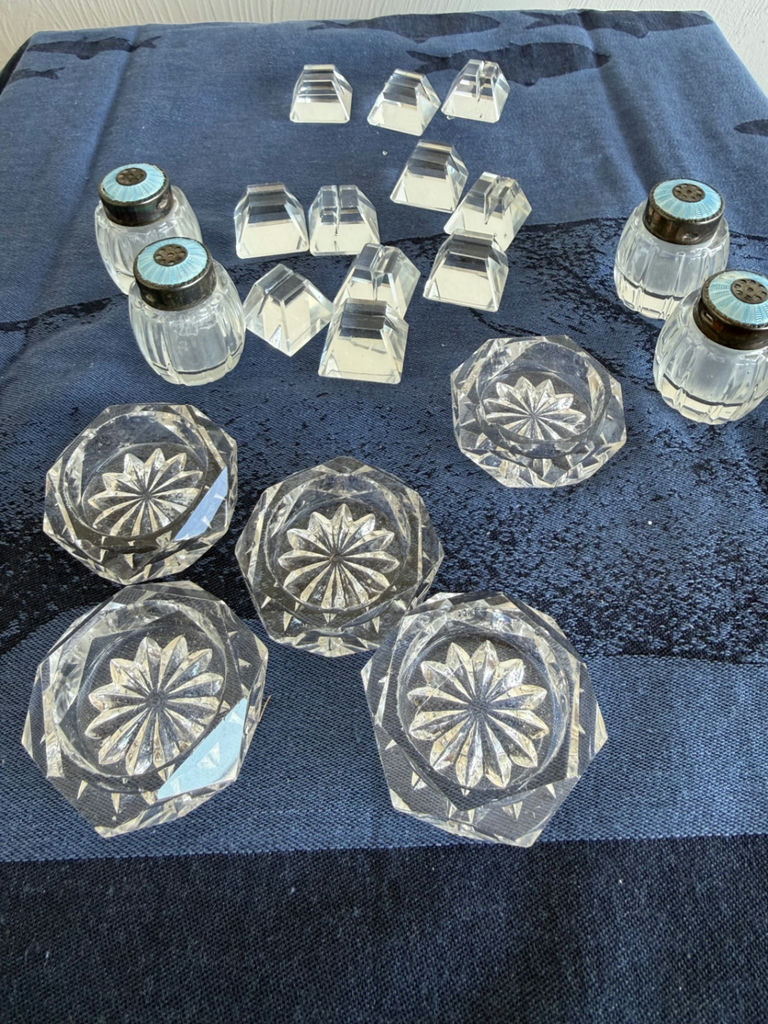 Crystal glass salt and pepper shakers with blue lids and assorted crystal knobs - image 1 of 3