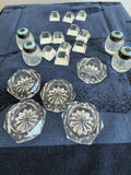 Crystal glass salt and pepper shakers with blue lids and assorted crystal knobs - thumbnail 1 of 3