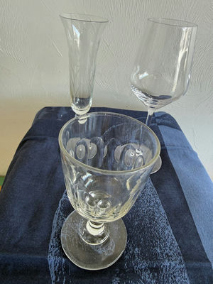 Glass stemware set: goblet, champagne flutes, and etched glass - Image 1 of 6