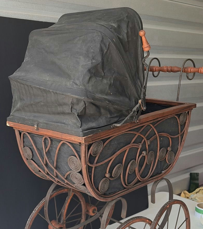 Antique wrought-iron baby carriage with decorative scrollwork - image 3 of 8