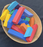 Colorful wooden blocks and a decorative carved gourd bowl - thumbnail 1 of 5