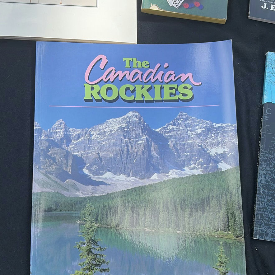Travel guides, gambling books, and a clock print - image 2 of 6