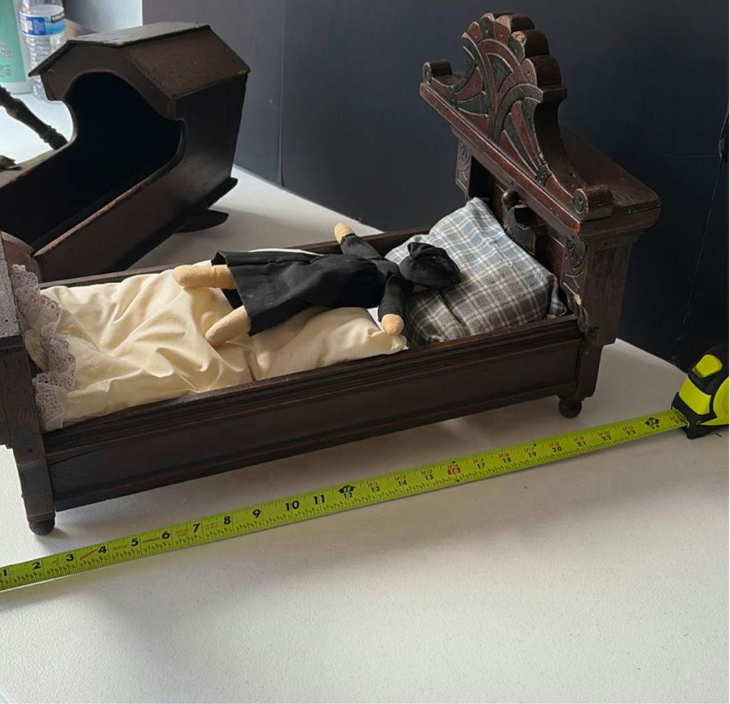 Antique carved wooden doll bed with doll and cradle piece - image 6 of 7