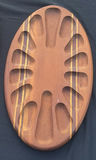 Pair of oval wooden boards with multiple recessed slots and decorative inlays - thumbnail 3 of 4
