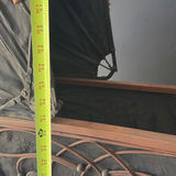 Antique wrought-iron baby carriage with decorative scrollwork - thumbnail 8 of 8