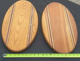 Pair of oval wooden boards with multiple recessed slots and decorative inlays - thumbnail 4 of 4