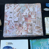 Assorted books, travel journals, and personal accessories - thumbnail 6 of 13