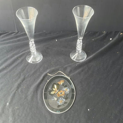 Two crystal champagne flutes and an oval enamel floral butterfly hanging ornament - Image 1 of 4