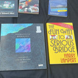 Travel guides, gambling books, and a clock print - thumbnail 6 of 6