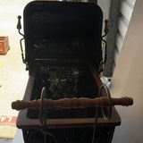 Antique wrought-iron baby carriage with decorative scrollwork - thumbnail 4 of 8