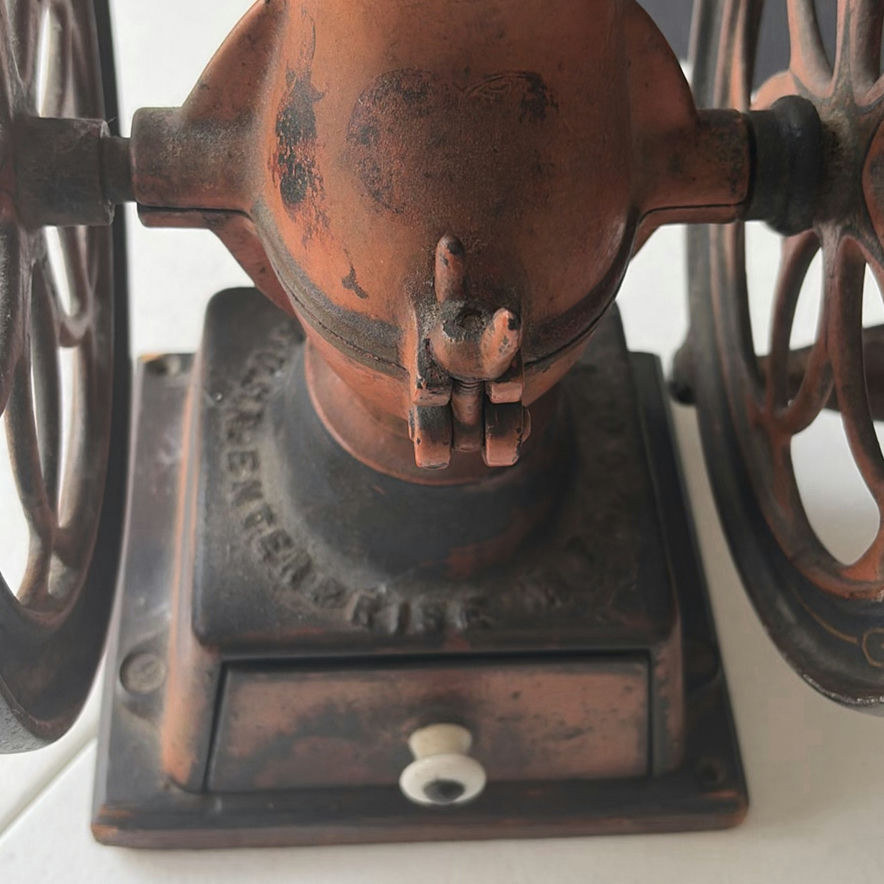 Antique hand-crank coffee grinder with dual wheels - image 4 of 6