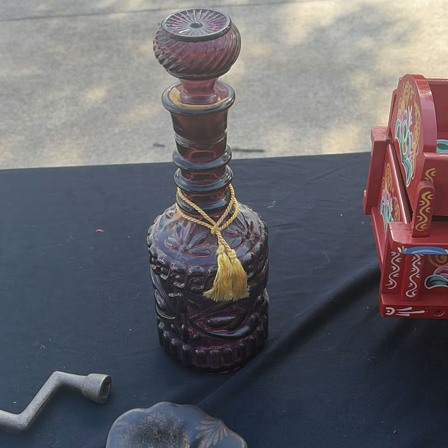 Assorted vintage decorative items: painted wooden wagon, abacus, bottle, dish, and crank - image 3 of 7