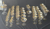 Gold-rimmed glassware set with punch bowl and stemware - thumbnail 1 of 5