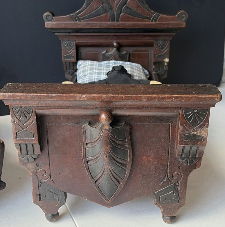 Antique carved wooden doll bed with doll and cradle piece - image 4 of 7