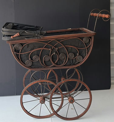 Antique wrought-iron baby carriage with decorative scrollwork - Image 1 of 8