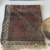 Assorted silver plate serving trays and bowls with a patterned woven rug - thumbnail 2 of 8