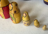 Matryoshka nesting dolls with decorative eggs and Alaska souvenir stickers - thumbnail 6 of 6